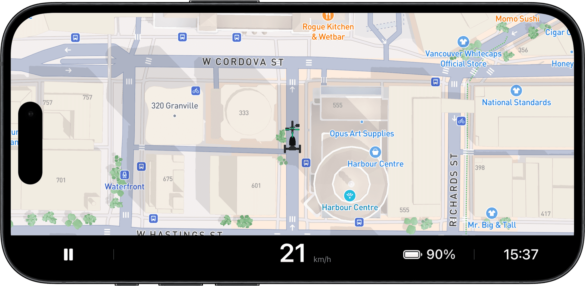 Open navigation through downtown streets, with the places around the rider named as they pass